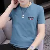 Nueva Camiseta de Moda Marca de Tendencia Cuello Redondo Manga Corta para Hombres Estilo Ins Juvenil Moderna Artística Corte Ajustado Versátil Verano