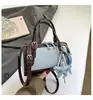 Bolsa Boston Versátil de Luxo Leve e de Nicho para Mulheres 2026 Novo Modelo Bolsa de Mão de Alta Qualidade Bolsa Transversal para Trabalho e Deslocamento Bolsa de Ombro