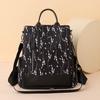 Primavera y Otoño nuevo tela de nylon color ligero simple personalidad mochila casual bolsa de mujer fábrica al por mayor comercio exterior