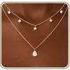 Conjunto de colar de três peças novo produto transfronteiriço da Amazon com pingente de cruz de cobre, gargantilha multicamadas, joias da moda, presente para mulheres