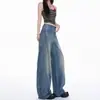 Diseño de patchwork estilo americano, jeans de corte curvo fluidos para mujer, nuevos pantalones de otoño de nicho de tiro bajo holgados de pierna ancha hasta el suelo