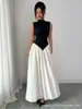 Vestido de Lujo Ligero Estilo Francés Transfronterizo Europeo y Americano 2026, Bloques de Color Blanco y Negro, Cuello Semi Alto, Sin Mangas, Ceñido a la Cintura, Vestido Largo Elegante