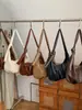 Cross2026 Outono Inverno Nova Bolsa de Axila Bolsa de Bolinho Versátil Retrô Estilo Simples Versátil para o Dia a Dia Bolsa de Ombro Único Transversal