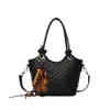 Bolso pequeño de moda de verano para mujer, nuevo estilo 2026, bolso tipo cubo con patrón tejido simple, bolso de hombro y bolso cruzado versátil