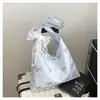 Bolso de Gran Capacidad Estilo Relajado para Mujer 2026 Nuevo Casual Versátil Bolso de Hombro para Viajes Diarios Bolso Ligero de Tela