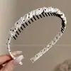 Diadema negra con dientes para lavarse la cara, nuevo modelo 2026 para mujer, diadema de corona alta para uso diario, pinza para el pelo