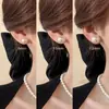 Pendientes de perlas con pasador de plata S925 para otoño e invierno, una colección de pendientes de estilo coreano modernos y elegantes que irradian un ambiente lujoso y sofisticado, y que actualmente son una tendencia popular en línea.