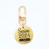 2024 Nuevo llavero de regalo de temporada de graduación de acero inoxidable redondo sombrero de soltero rollo de libro regalo de temporada de graduación para compañeros de clase Conmemorativo