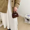 Bolsa Infantil Nueva Dulce de Lunares Otoño/Invierno 2026 Bolso de Mano con Estampado para Niñas Bolso Cruzado Runway Platino Lipstick para Mujer
