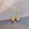 Pendientes de Lujo Accesible de Gama Alta Color Oro Champagne Perla Diseño de Nicho Retro Únicos Elegantes Nuevos Pendientes de Moda