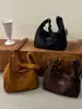 Bolsa Grande de Cor Lisa Personalizada 2026 Novo Estilo Outono Inicial Moda Ombro Único Sobrancelha Bolsa Tote Relaxada para o Dia a Dia