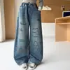 Nuevos jeans de mezclilla de primavera y otoño para niñas mayores, ropa infantil, jeans con grafitis elegantes y versátiles para niñas