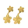 Aretes de flor dorada para mujer, aretes versátiles de moda de lujo ligero, diseño de nicho con un toque de alta gama, comercio exterior transfronterizo