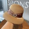 Estilo festivo gorra de lámpara Hepburn 2025 nueva hebilla de anillo de diamantes de imitación gorra de cuenca sombrero de sol de alto color ala grande sombrero de playa