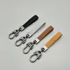 Padrão Embossado Texto Carro Metal Chaveiro Carro Anti-Perda Pingente Chaveiro Joia Argola de Chaveiro Presente Lote