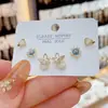 Pendientes de combinación de flores de circonita dulce de Niche, delicados pendientes de mariposa con piedra de ojo de gato, conjunto de tres piezas, con pasador de plata