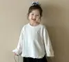 Conjunto de camisetas estilo coreano para niñas, nuevo modelo otoño 2026, versátil camiseta básica de algodón de manga larga, elegante, para niñas pequeñas