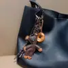 Nuevo Llavero de Cuerda Tejida a Mano de Oso de Cuero de Pan Sencillo Colgante de Decoración de Bolsa Lindo y Lindo de Nicho Oso de Peluche