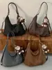 Bolso tote retro popular de temporada cruzada bolso de axila nuevo estilo moda Otoño 2026 bolso de hombro sensación de alta gama mochila