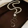 Collar redondo de perlas con cuentas estilo francés, sensación de lujo ligero y alta gama, cadena de suéter de doble capa, accesorio de nicho de diseño único para mujer