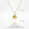 Nuevo collar de acero inoxidable de estilo europeo y americano transfronterizo que no se decolora, con modernos colgantes de corazón, hoja, cruz y cuentas