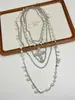 Collar de Perlas Multicapa de Lujo Ligero Europeo y Americano con Colgante de Cruz de Diseño Único Cadena para Clavícula Joyería de Cuello de Moda para Mujeres