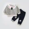 Conjunto de duas peças listrado macio de manga longa, estilo regular, versátil, solto, com retalhos, para primavera e outono, para sair