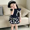 Conjunto Doce de Verão para Meninas 2026 Novo Estiloso Conjunto de Duas Peças Moda Infantil com Camiseta de Renda e Saia-Calça Floral