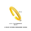 Pulsera de moneda de cobre hueca chapada en oro vietnamita para mujer, lujo ligero con un toque de alta gama, versátil, con detalles dorados tradicionales e incrustaciones de diamantes, adecuada para regalar