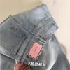 Calça Jeans de Cintura Alta Reta Versátil com Caimento Largo e Tag de Couro de Personalidade Estilo Americano para Mulheres, Primavera e Outono