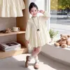 Conjunto Infantil Primavera y Otoño Chaqueta Abrigo de Cuero para Niñas 2026 Nuevo Elegante Vestido Estilo Princesa para Bebé Conjunto de Dos Piezas