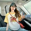 Camiseta Raglan Manga Curta Estilo Retrô Americano para Mulheres 2026 Novo Verão Estilo College Redutor de Idade Estampa de Desenho Top Solto