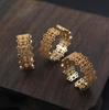 Europa y Estados Unidos estilo frío retención de color oro patrón simple anillo hueco accesorios de joyería antigua anillo retro
