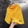 Shorts Confortáveis com Cintura Elástica Bordados 2026 Verão Novo Respirável Secagem Rápida Tendência Roupa de Casal Comprimento Médio