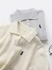 Nueva Camiseta de Punto de Algodón Puro de Manga Corta para Niños y Niñas con Bordado, Versátil Camiseta Clásica Básica con Cuello Polo de Punto Trenzado