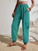 Moda Feminina Europeia e Americana Amazon Tiktoktemu Primavera/Verão 2026 Novo Versátil Cor Sólida Bolso Casual Roupa de Trabalho Calças Femininas