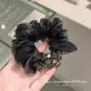 Selección PremiumElásticos elegantes y con estilo, nueva colección de accesorios para el cabello de nicho de alta gama para recoger el cabello en la parte posterior de la cabeza