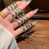Atacado do Fabricante: Pulseira de Borboleta de Jade Verde Natural Xiaohongshu com Inlay de Prata S925, Design Fresco e Simples