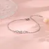 Pulsera de Zirconia Infinito Doble Símbolo de Ocho Caracteres Amor Infinito Pulsera de Líneas Cruzadas Moda Única Hermosa Regalo de Cumpleaños
