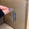 Pendientes de Borla con Rombo de Diamante de Aguja Plateada Pendientes de Nicho Transfronterizos Europeos y Americanos Lujo Ligero Versátiles Pendientes de Alta Gama Venta al por Mayor para Mujeres