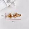 Accesorios de joyería DIY exquisitos de cobre chapado en oro real con incrustaciones de circonita hebilla doble flor lazo huecos accesorios de joyería al por mayor