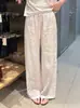 Pantalones de lino rosa importado de alta gama y lujo ligero para mujer, moda coreana primavera temprana 2026, pantalones versátiles de longitud completa