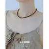 Collar Estilo Maillard Ojo de Tigre Lujo Accesible Moda Retro Gama Alta Cadena para Suéter con Cuentas Nuevo Otoño e Invierno 2025