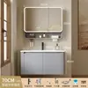 Tocador de baño engrosado y ahorrador de espacio con diseño en color crema, que cuenta con un lavabo redondeado, lavabo cerámico integrado y un lavabo de una sola pieza.