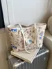 Bolso Graffiti de Gran Capacidad Transfronterizo para Mujer 2025 Nuevo Bolso de Hombro Versátil Casual Bolso Tote de Nicho para el Trabajo