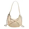 La popular bolsa cruzada portátil con lazo dulce de este año para mujer, nueva de primavera 2025, de nicho, de alta gama, tipo bandolera