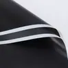 Papel de regalo impermeable nuevo, blanco y negro, con diseño de flor noble, con borde blanco y negro, película mate, materiales para envolver flores de floristería, disponible en stock, venta al por mayor