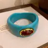 Pulseira redonda com rebite de flor em resina e madeira, transfronteiriça europeia e americana, moderna, simples, nicho, elegante, joia feminina de alta qualidade
