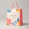 Sacolas de presente coloridas, tamanho pequeno, atacado, direto do fabricante, espessadas e ecológicas, disponíveis em várias cores, adequadas para casamentos, lembrancinhas de doces e estudantes