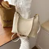 Bolsa Feminina Transfronteiriça de Alta Qualidade Estilo Retrô Bolsa Transversal Feminina Outono 2026 Nova Tendência Simples Moda Versátil Ombro Único Bolsa de Axila